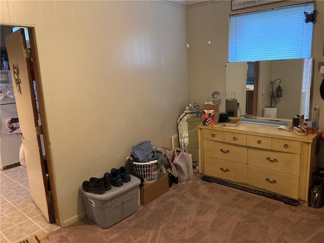 121 S Willis Ave, Independence, MO 64050 - bedroom with light colored carpet and fridge