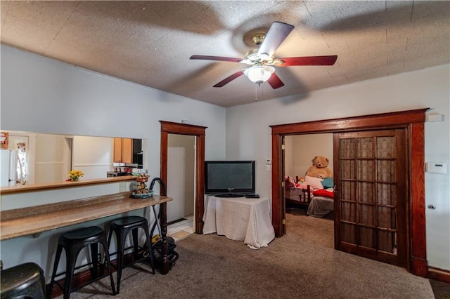 911 N 6th St, Atchison, KS 66002 - living room featuring light colored carpet and a ceiling fan