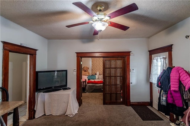 911 N 6th St, Atchison, KS 66002 - interior space with a ceiling fan, carpet flooring, and a textured ceiling