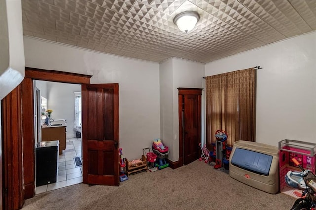 911 N 6th St, Atchison, KS 66002 - game room featuring carpet floors