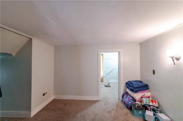 911 N 6th St, Atchison, KS 66002 - playroom with carpet floors and baseboards