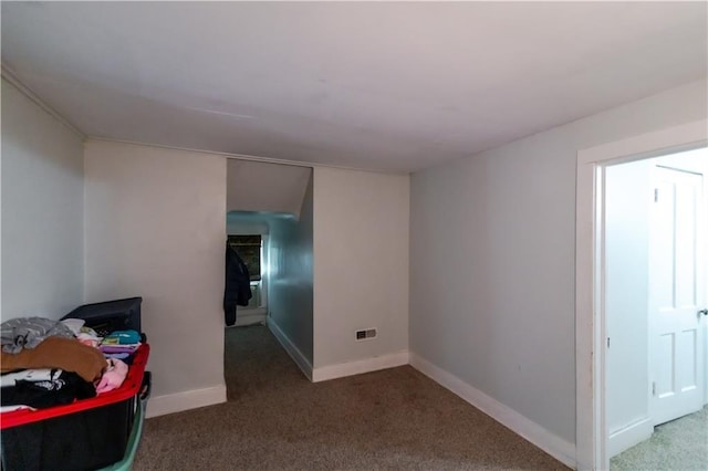 911 N 6th St, Atchison, KS 66002 - carpeted bedroom featuring baseboards