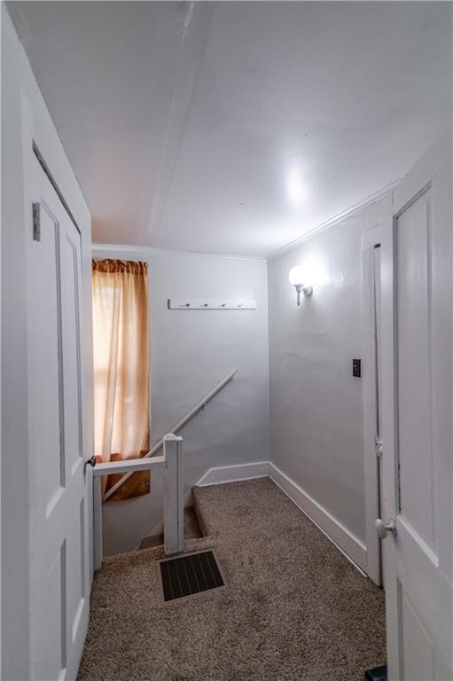 911 N 6th St, Atchison, KS 66002 - corridor with carpet
