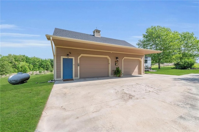 11261 238th St, Lawrence, KS 66044 - garage featuring driveway