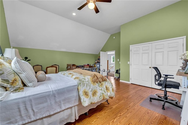 11261 238th St, Lawrence, KS 66044 - bedroom with wood finished floors, lofted ceiling, a ceiling fan, a closet, and recessed lighting