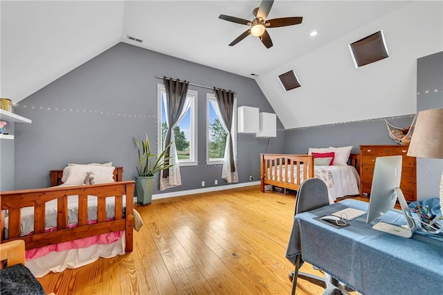 11261 238th St, Lawrence, KS 66044 - bedroom featuring vaulted ceiling, hardwood / wood-style flooring, an office area, baseboards, and recessed lighting