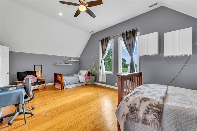 11261 238th St, Lawrence, KS 66044 - bedroom featuring vaulted ceiling, baseboards, light wood-style floors, a ceiling fan, and recessed lighting
