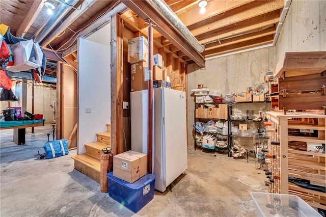 11261 238th St, Lawrence, KS 66044 - unfinished basement featuring freestanding refrigerator, stairs, and pool table