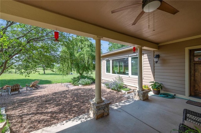 11261 238th St, Lawrence, KS 66044 - view of patio / terrace with ceiling fan