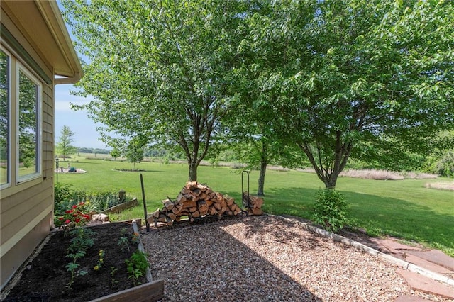 11261 238th St, Lawrence, KS 66044 - view of green lawn featuring a garden