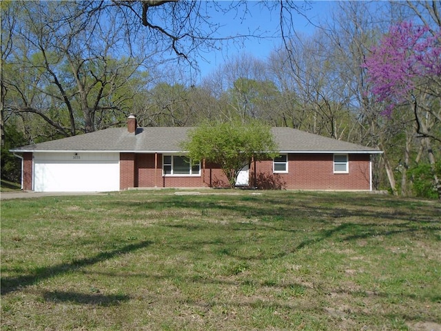 3020 N 81st St, Kansas City, KS 66109 - ranch-style home with a garage, brick siding, a front lawn, a chimney, and driveway