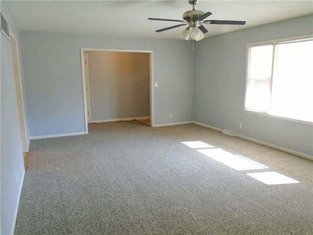 3020 N 81st St, Kansas City, KS 66109 - unfurnished room featuring carpet flooring, ceiling fan, and baseboards