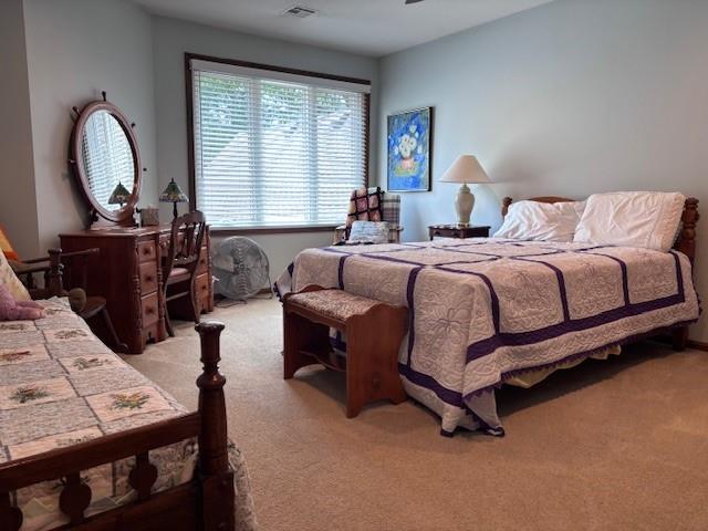 9803 W 121st St, Overland Park, KS 66213 - bedroom with light carpet