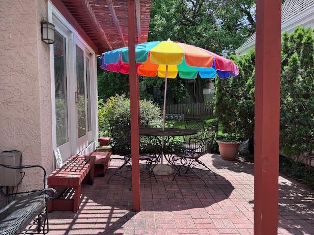 9803 W 121st St, Overland Park, KS 66213 - view of patio featuring outdoor dining space
