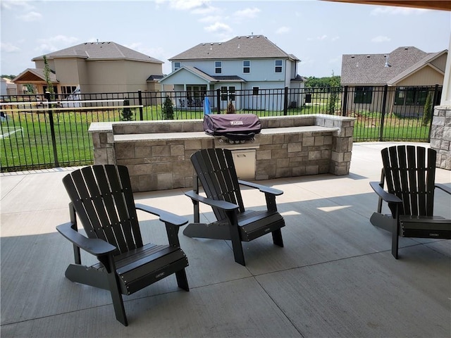 17125 W 168th Pl, Olathe, KS 66062 - view of patio featuring an outdoor kitchen and a grill