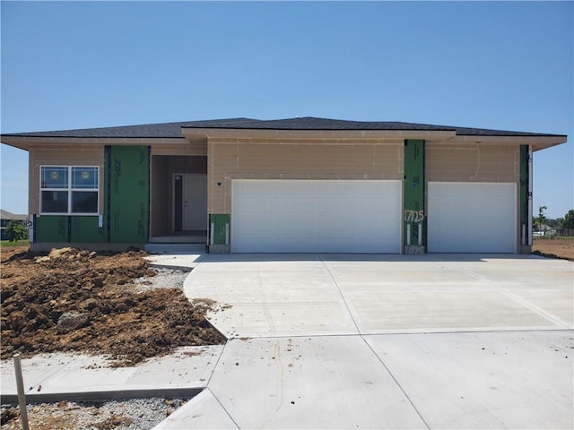 17125 W 168th Pl, Olathe, KS 66062 - view of front of home with driveway and a garage