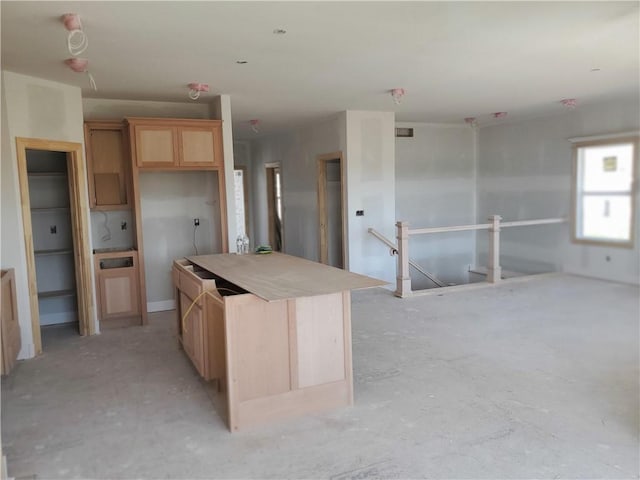 17125 W 168th Pl, Olathe, KS 66062 - kitchen featuring a center island and light brown cabinets