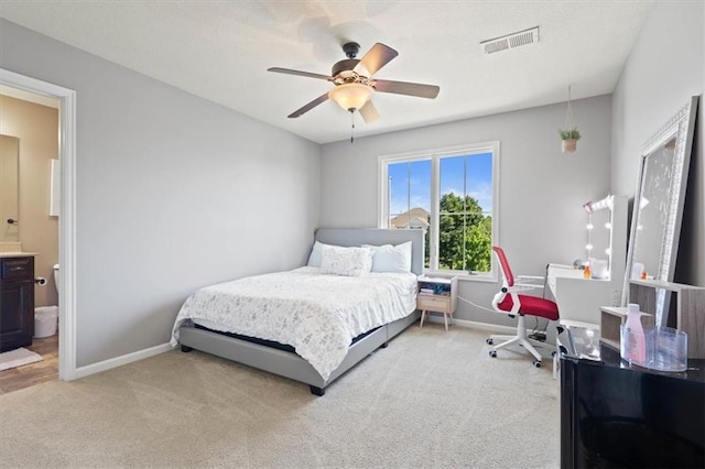 15825 Howe St, Overland Park, KS 66224 - carpeted bedroom featuring baseboards, ceiling fan, and ensuite bathroom