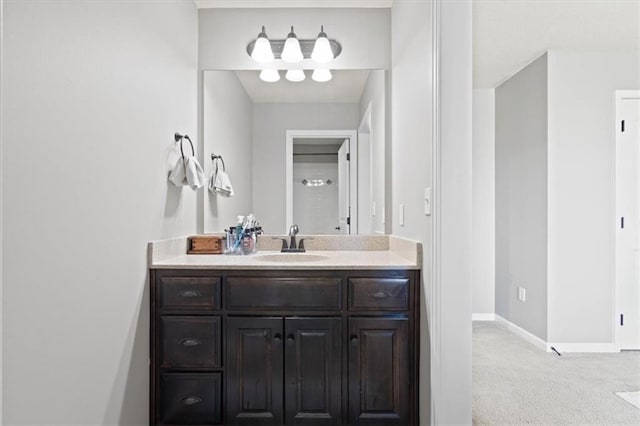 15825 Howe St, Overland Park, KS 66224 - bathroom featuring vanity and baseboards