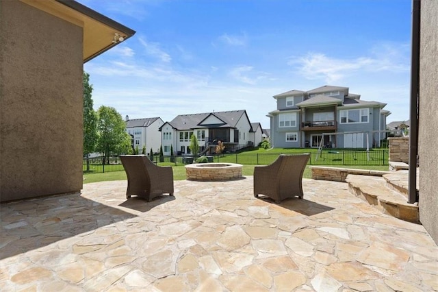 15825 Howe St, Overland Park, KS 66224 - view of patio featuring a residential view and an outdoor fire pit