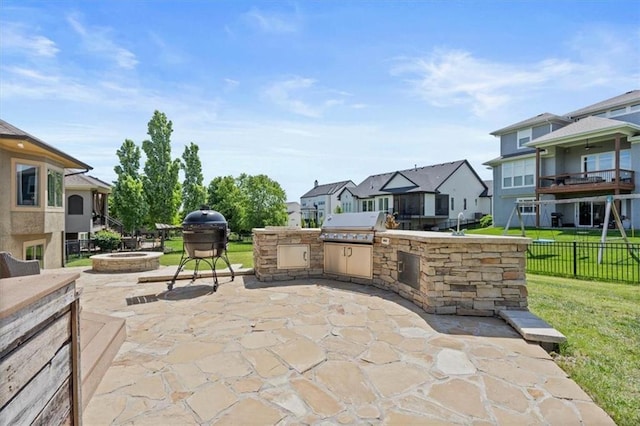 15825 Howe St, Overland Park, KS 66224 - view of patio with a residential view and a fire pit