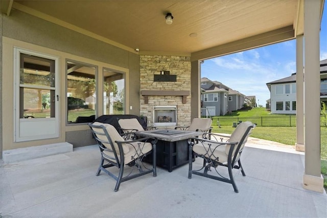 15825 Howe St, Overland Park, KS 66224 - view of patio with an outdoor stone fireplace and a residential view