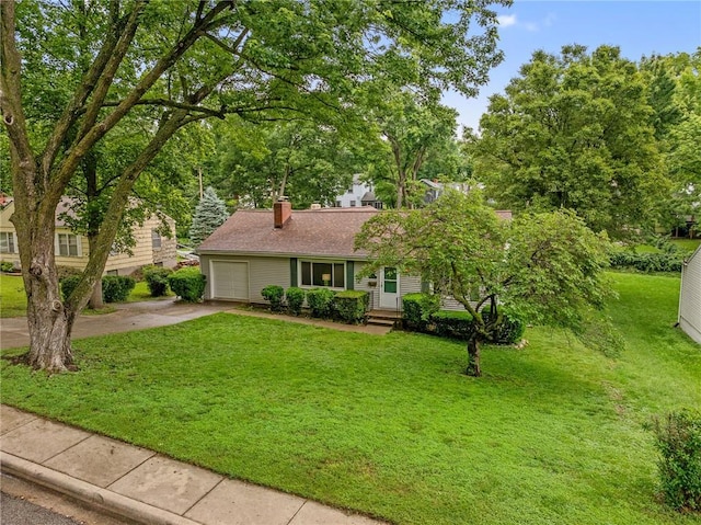 5347 Buena Vista St, Roeland Park, KS 66205 - view of front of home featuring driveway, a chimney, a front lawn, and an attached garage
