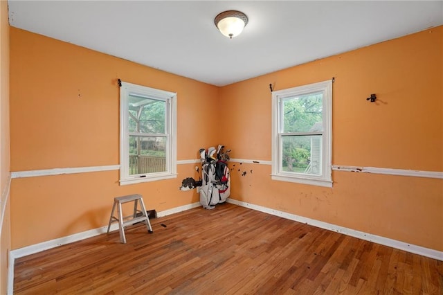 5347 Buena Vista St, Roeland Park, KS 66205 - exercise room featuring healthy amount of natural light, wood finished floors, and baseboards