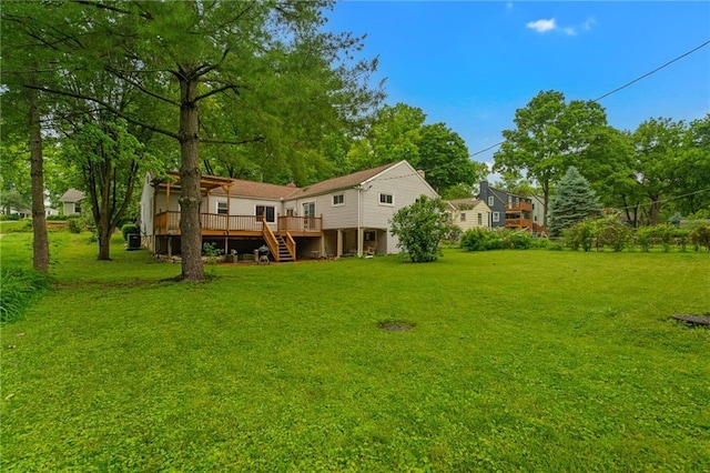 5347 Buena Vista St, Roeland Park, KS 66205 - back of property with a deck, stairway, and a lawn