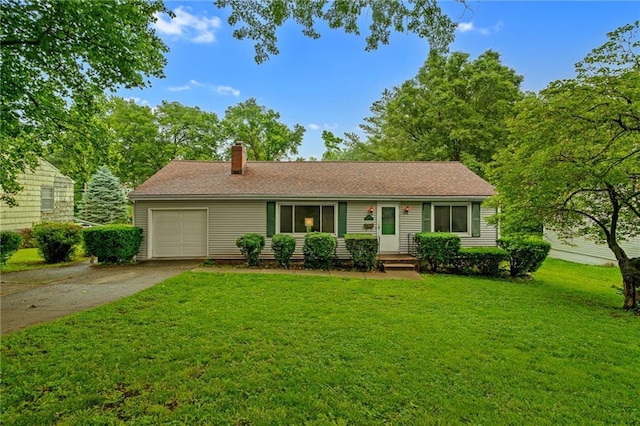 5347 Buena Vista St, Roeland Park, KS 66205 - ranch-style home with a chimney, driveway, a front yard, and a garage
