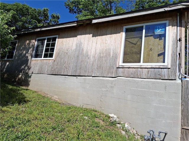 view of side of property featuring crawl space
