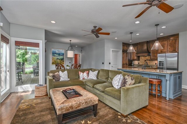 4502 Verona Ct, Riverside, MO 64150 - living area with a ceiling fan, dark wood finished floors, and recessed lighting