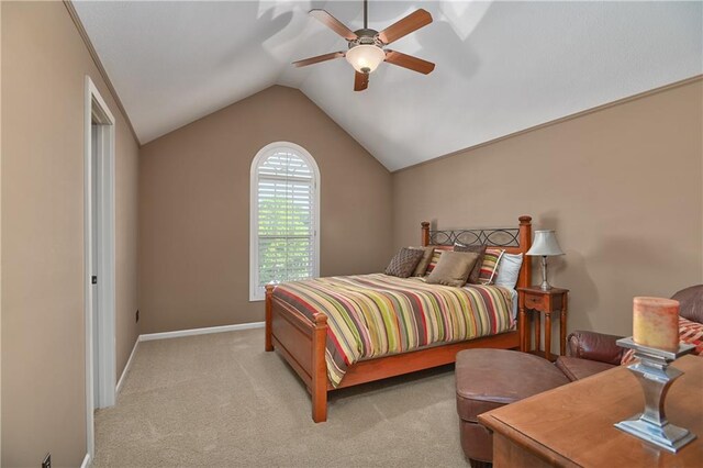 4502 Verona Ct, Riverside, MO 64150 - bedroom with lofted ceiling, light carpet, baseboards, and a ceiling fan