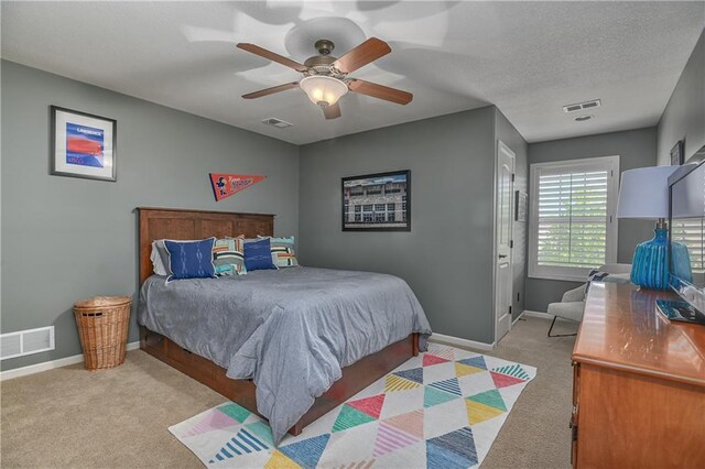 4502 Verona Ct, Riverside, MO 64150 - bedroom with light carpet, baseboards, and a ceiling fan