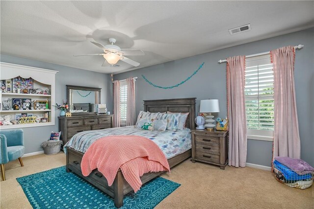 4502 Verona Ct, Riverside, MO 64150 - carpeted bedroom with ceiling fan and baseboards