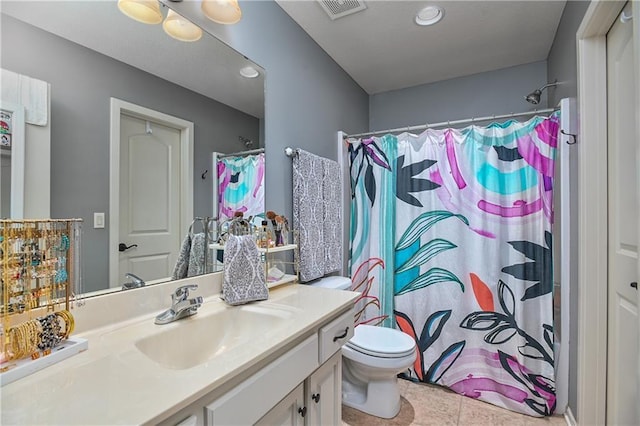 4502 Verona Ct, Riverside, MO 64150 - full bathroom featuring vanity, toilet, tile patterned floors, a shower with curtain, and recessed lighting