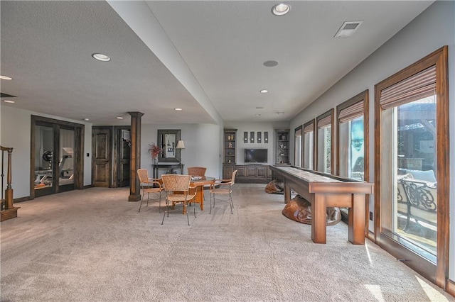 4502 Verona Ct, Riverside, MO 64150 - carpeted dining space featuring recessed lighting and decorative columns
