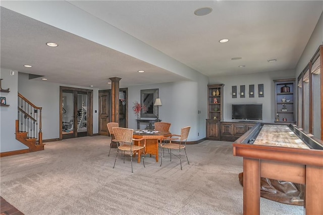 4502 Verona Ct, Riverside, MO 64150 - carpeted dining space with baseboards, decorative columns, recessed lighting, and stairs