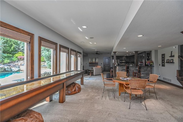 4502 Verona Ct, Riverside, MO 64150 - dining space featuring light colored carpet, recessed lighting, and ceiling fan