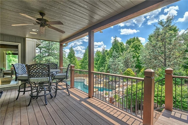 4502 Verona Ct, Riverside, MO 64150 - wooden terrace with outdoor dining space and a ceiling fan