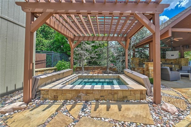 4502 Verona Ct, Riverside, MO 64150 - view of patio with an in-ground hot tub, ceiling fan, an outdoor kitchen, and a fenced backyard