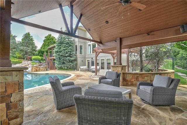 4502 Verona Ct, Riverside, MO 64150 - view of patio featuring stairs, ceiling fan, an outdoor pool, fence, and an outdoor hangout area