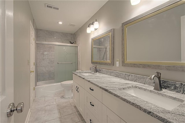 full bathroom featuring toilet, shower / bathtub combination, double vanity, and recessed lighting