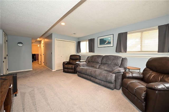 15363 S Darnell St, Olathe, KS 66062 - carpeted living area featuring a textured ceiling, baseboards, and recessed lighting