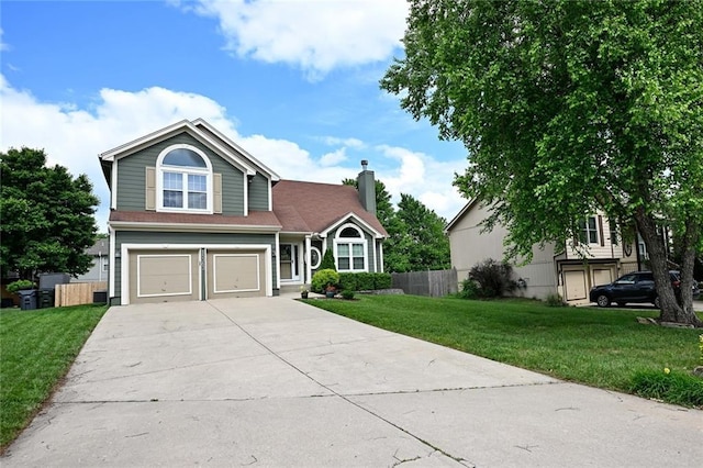 15363 S Darnell St, Olathe, KS 66062 - traditional-style home with a garage, driveway, and a chimney