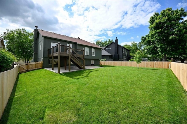 15363 S Darnell St, Olathe, KS 66062 - rear view of house featuring a patio, a wooden deck, and stairs