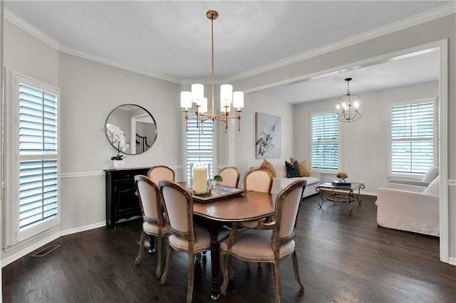5318 W 159th Ter, Overland Park, KS 66085 - dining area featuring a chandelier, dark wood finished floors, baseboards, and crown molding