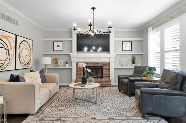 5318 W 159th Ter, Overland Park, KS 66085 - living area featuring a chandelier, ornamental molding, built in features, and a brick fireplace