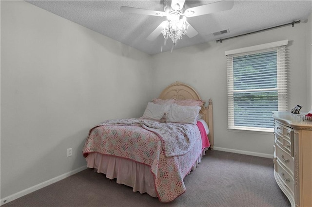 5318 W 159th Ter, Overland Park, KS 66085 - carpeted bedroom with a textured ceiling, baseboards, and ceiling fan