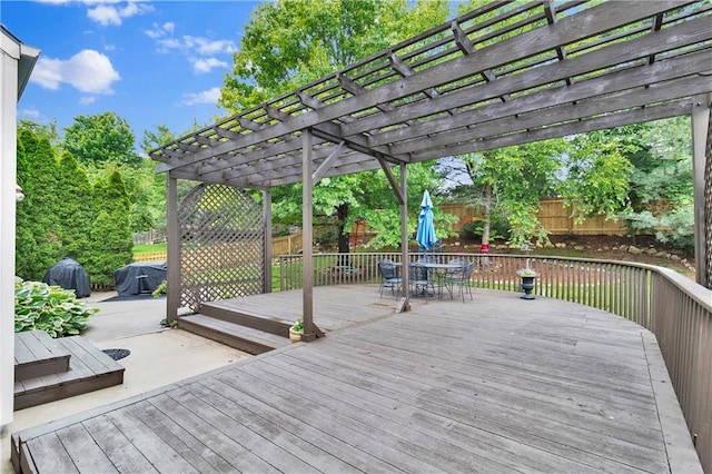 5318 W 159th Ter, Overland Park, KS 66085 - wooden terrace with outdoor dining space, a fenced backyard, and a pergola